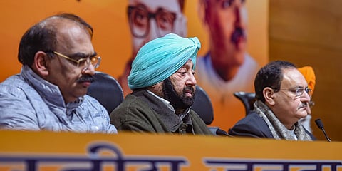 BJP chief JP Nadda (R), party's state unit president Ashwani Kumar Sharma and former CM Amarinder Singh address a press conference. (Photo| PTI)