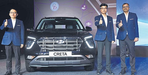 Top Hyundai executives including S.S Kim, MD and CEO (R) along with Creta. (Photo | EPS file)