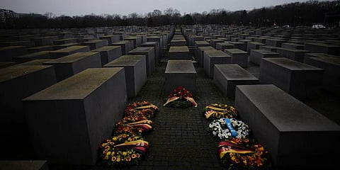 Wreaths placed at the Memorial to the Murdered Jews of Europe on the International Holocaust Remembrance Day in Berlin, Germany. (Photo | AP)