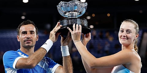 Kristina Mladenovic and Ivan Dodig celebrate after defeating Jaimee Fourlis and Jason Kubler in the mixed doubles final at the Australian Open tennis championships in Melbourne. (Photo | AP)