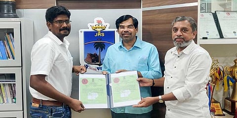 Dr Senthil Kumar and Dr Mani Panangal presenting the patent certificate to St Joseph's College principal Dr M Arockiasamy Xavier SJ at the college campus in Tiruchy on Thursday | Express