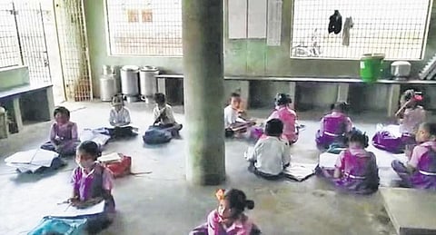 Students attend classes at a dairy building in VV Palem in Vizanagaram | EXPRESS