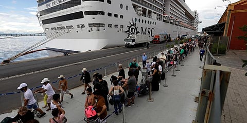 Passengers disembark from the cruise ship 'MSC Preziosa', in the Port Area of Rio de Janeiro, Brazil after Brazil's Sanitary Agency has confirmed more cases of COVID-19 on board. (Photo | AP)