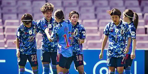 Japan's Yuika Sugasawa celebrates with teammates after scoring their first goal, during the AFC Women's Asian Cup 2022 quarterfinals football match against Thailand, Jan. 30, 2022. (Photo | PTI)
