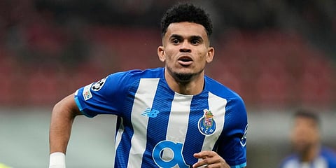 FILE - Porto's Luis Diaz celebrates after scoring his side's opening goal during the Champions League group B match against AC Milan at the San Siro stadium in Milan, Italy, Nov 3, 2021. (Photo | AP)