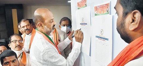 BJP State president Bandi Sanjay Kumar inaugurates the ‘One Crore Signatures Campaign’ at the State party headquarters in Hyderabad on Sunday | S Senbagapandiyan