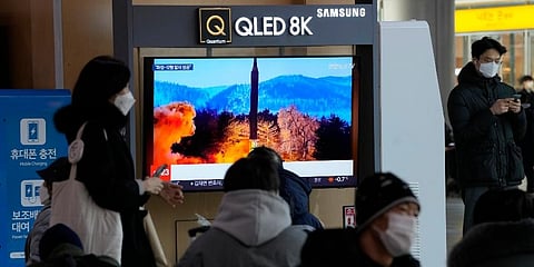 People watch a TV showing an image of North Korea's missile launch during a news program at the Seoul Railway Station in Seoul. (Photo | AP)