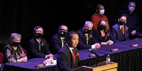 Mayor Sokhary Chau addresses the assembly during the Lowell City Council swearing-in ceremony, in Lowell, Mass., held at Lowell Memorial Auditorium due to the COVID-19 pandemic. (Photo | AP)