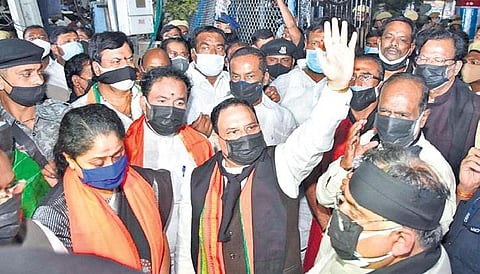 BJP national president JP Nadda waves to the crowd after paying floral tributes at Mahatma Gandhi statue in Secunderabad on Tuesday, Jan 4, 2022.
