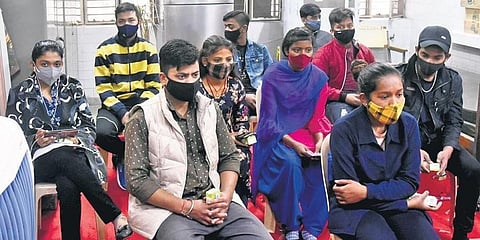 Teens sit in an observation room after receiving the vaccine. (Photo | Parveen Negi, EPS)