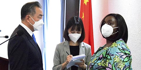 China's Foreign Minister (L) speaks with Kenya's Foreign Affairs Cabinet Secretary(R), after a press conference, at the Sarova Whitesands Hotel in, Mombasa, Kenya,(Photo | AP)