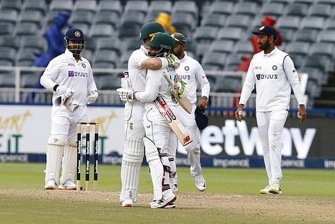 South Africa's Dean Elgar and Temba Bavuma celebrate winning the second cricket test between South Africa and India at the Wanderers stadium in Johannesburg. (Photo | AP)