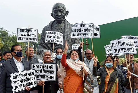 BJP MPs protest against Congress party over Ferozepur incident, in front of Mahatma Gandhi statue at Parliament, in New Delhi, Friday, Jan.7, 2022. (Photo | PTI)