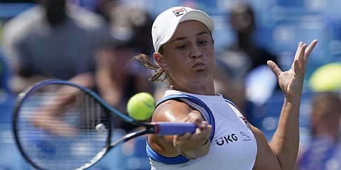 Ashleigh Barty, of Australia, returns a shot to Jil Teichmann, of Switzerland, in the women's single final of the Western & Southern Open tennis tournament.(Photo | AP)