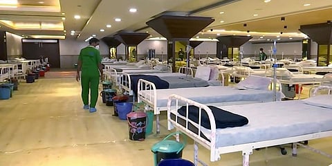 Beds are seen at Shehnai Banquet isolation center amid increasing COVID-19 cases, opposite Lok Nayak Jai Prakash Narayan hospital in New Delhi. (File photo| ANI)