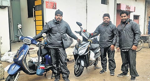 The three men who started the all-India road trip from Kerala on electric scooters