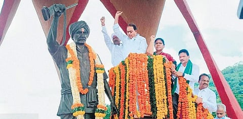 Minster A Indrakaran Reddy addresses the gathering on the occasion of Komaram Bheem’s 82 death anniversary in Jodeghat on Sunday