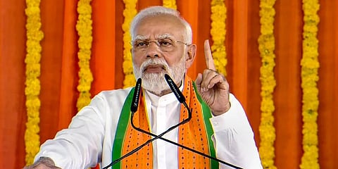 Prime Minister Narendra Modi addresses during the launch of development initiatives in Amod, Gujarat (Photo | PTI)