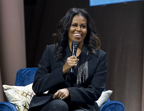 Former first lady Michelle Obama speaks to the crowd as she presents her anticipated memoir 'Becoming' during her book tour stop in Washington. (Photo | AP)