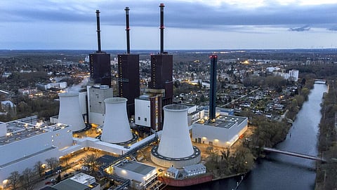 Steam leaves a cooling tower of the Lichterfelde gas-fired power plant in Berlin, Germany, on March 30, 2022. (Photo | AP)