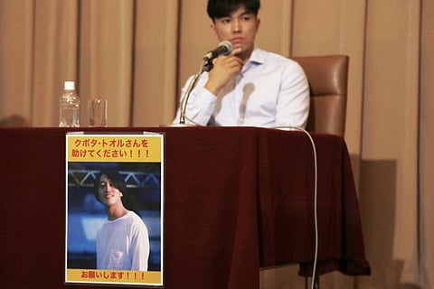 An image of Toru Kubota, a Japanese journalist detained in Myanmar while covering a protest, is displayed at the Japan Press Club in Tokyo. (Photo | AP)