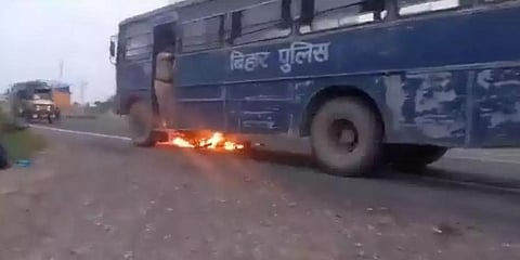 The bus dragged the motorcycle for a couple of metres, following which the fuel tank of the two-wheeler exploded. (Photo | Twitter)
