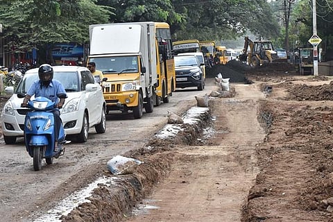 Slow pace of underground drainage work in Podanur irks road users