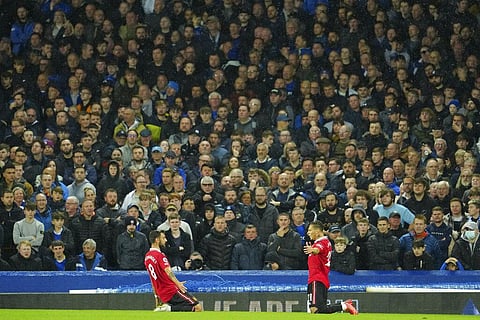 Man United's Antony celebrates with Bruno Fernandes after scoring their side's first goal during the Premier League soccer match between Everton and Manchester United at Goodison Park. (Photo | AP)