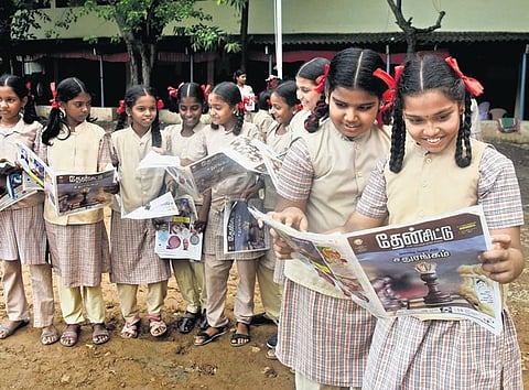 Students with one of the new magazines brought out by the school education department at government girls higher secondary school in Porur | Martin Louis