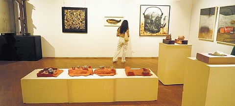 A viewer at the (7, 8 & 9) ongoing exhibition.