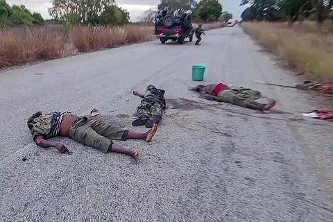 In this image made from video, the bodies of dead militants are seen on a road on the outskirts of Mocimboa Da Praia, in Cabo Delgado province, Mozambique. (Photo | AP)
