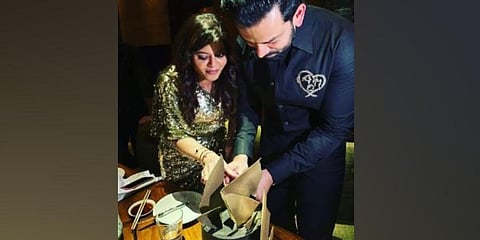 Prithviraj Sukumaran and his wife celebrating his birthday.