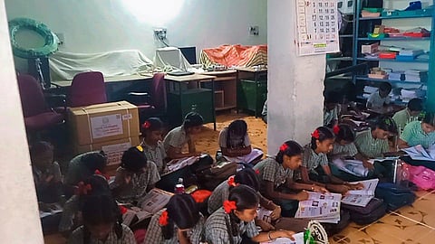 Students studying in an office room in panchayat union primary school in Velluvadi in Perambalur district. (Photo |Express)