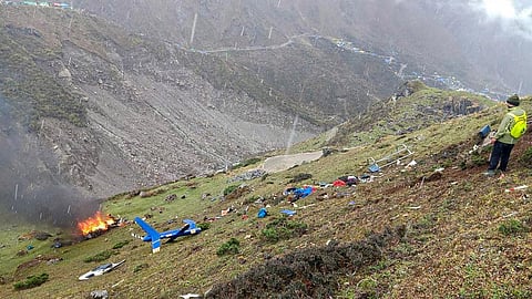 Rescue work underway after a helicopter carrying pilgrims crashed near Kedarnath in Uttarakhand. (Photo | PTI)