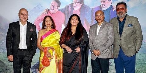 Bollywood actors Anupam Kher, Neena Gupta, Sarika and Boman Irani pose for photos with director Sooraj Barjatya during the trailer launch of their upcoming movie 'Uunchai'.(Photo | PTI)