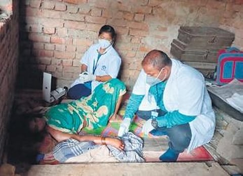 Caregivers attending a patient