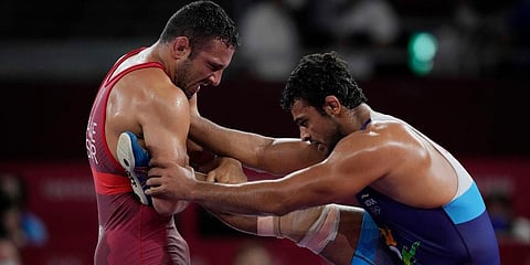 San Marino's Myles Nazem Amine and India's Deepak Punia compete during the men's 86kg Freestyle wrestling bronze medal match at the 2020 Summer Olympics in Tokyo, Japan. (File photo | AP)