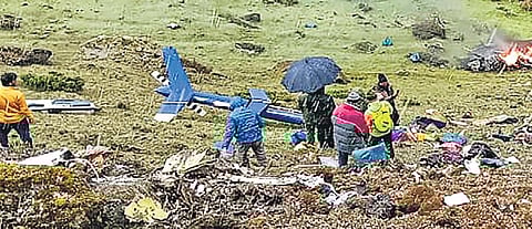 Locals at the site after a helicopter carrying pilgrims crashed near Kedarnath in Uttarakhand on Tuesday | PTI