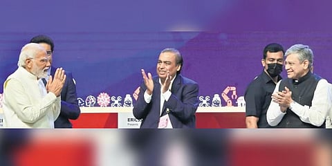 PM Narendra Modi with RIL chairman Mukesh Ambani and Union IT Minister Ashwini Vaishnaw at the 6th India Mobile Congress in New Delhi on Saturday | Shekhar Yadav