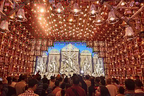 View of a community Durga Puja pandal during the sixth day of the Durga Puja festival in South Dinajpur on October 2, 2022. (Photo | PTI)