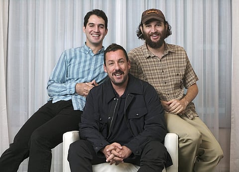 Hollywood star Adam Sandler and filmmaker duo Josh and Benny Safdie. (Photo | AP)