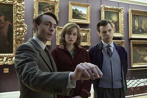 This image released by Amazon shows, from left, David Dawson, Emma Corrin and Harry Styles in a scene from 'My Policeman.' (Photo | AP)