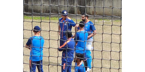 Rohit Sharma with head coach Rahul Dravid and teammates during a practice session ahead of the ICC Men's T20 World Cup cricket match against Pakistan, in Australia. (PTI | Photo)