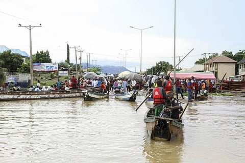 This file image shows people stranded due to floods following several days of downpours, in Kogi Nigeria, Thursday, Oct. 6, 2022. (Photo | AP)