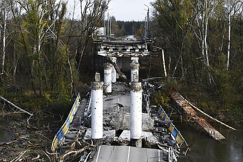 A view of a damaged bridge in the retaken village of Bohorodychne, eastern Ukraine, Saturday, Oct. 22, 2022. (Photo | AP)