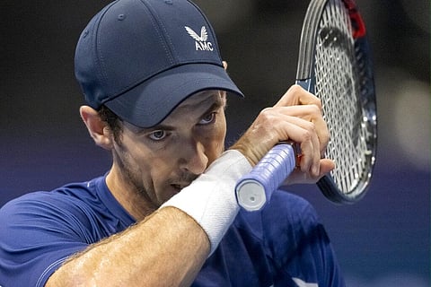 Great Britain's Andy Murray wipes his face during their first round match with Russia's Roman Safiullin at the Swiss Indoors tennis tournament at the St. Jakobshalle in Basel, Switzerland | AP
