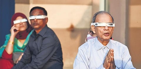 People watch the solar eclipse at Nehru Planetarium on Tuesday | Parveen Negi