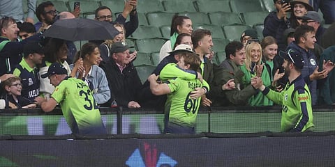 Ireland players celebrate with fans following their T20 World Cup cricket match against England in Melbourne, Australia, Wednesday, Oct. 26, 2022.(Photo | AP)