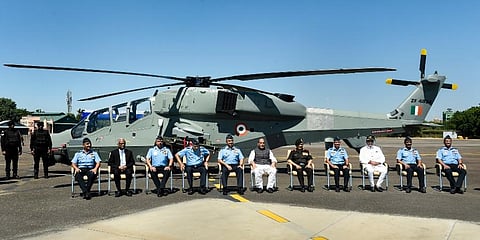 Union Defence Minister Rajnath Singh with Chief of Defence Staff General Anil Chauhan and others during a ceremony to induct the first batch of indigenously developed LCH. (Photo | PTI)