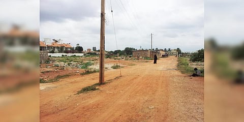 The 1-km stretch in Jakkur has been blocked to prevent owners from reaching their sites | Express